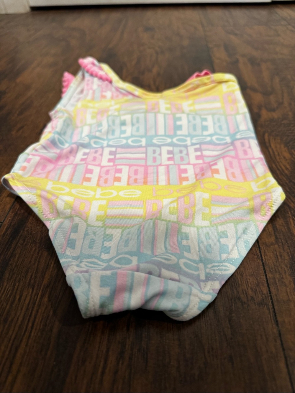 bebe Pastel Pink, Yellow & Blue One-Shoulder Ruffle Kids Swimsuit - Picture 5 of 7
